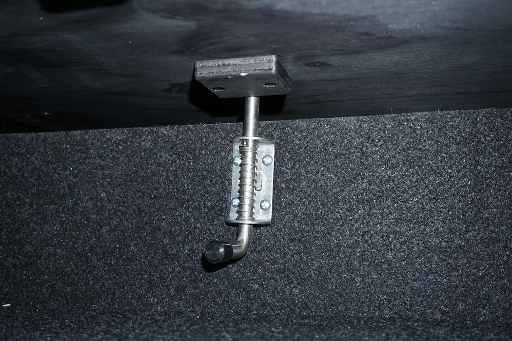 Spring latch in each drawer prevents pulling too far unintentionally